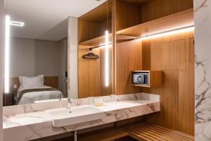 Amazon Aeroporto Hotel客房内的一张或多张床位