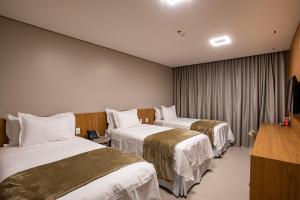 Amazon Aeroporto Hotel客房内的一张或多张床位