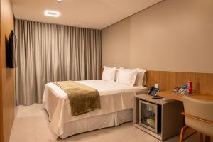 Amazon Aeroporto Hotel客房内的一张或多张床位