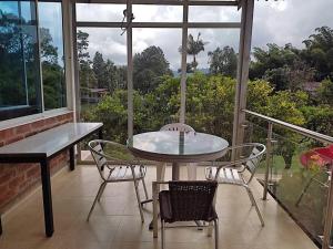 Balkoni atau teres di Eco Hotel La Primavera - Cabañas Campestres de Descanso
