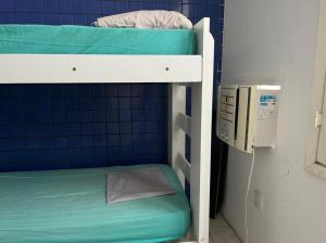 Postel nebo postele na pokoji v ubytování Pousada Linda In Ipanema