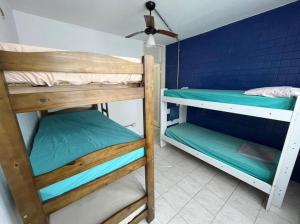 Postel nebo postele na pokoji v ubytování Pousada Linda In Ipanema