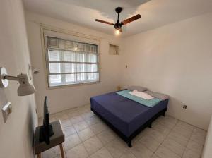 Postel nebo postele na pokoji v ubytování Pousada Linda In Ipanema