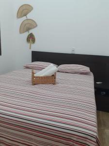Кровать или кровати в номере Casaluardosmilagres