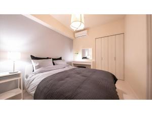a bedroom with a large bed in a room at Hotel Best Price Kochi - Vacation STAY 17532v in Kochi +16 photos