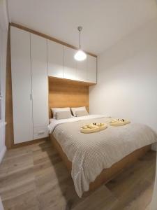 Ένα ή περισσότερα κρεβάτια σε δωμάτιο στο Apartman N&V, Villa Mont Jahorina +9 φωτογραφίες