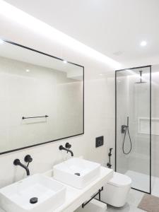 Kylpyhuone majoituspaikassa Filomena Apartments BOHÈME