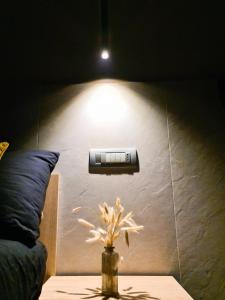 Una cama o camas en una habitación de Falco Suite Apartment
