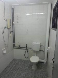 a bathroom with a toilet and a shower at Ipoh Rent Room 33 in Ipoh
