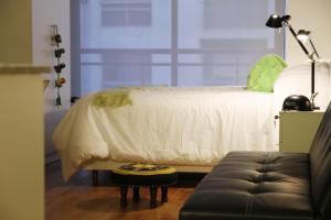 Кровать или кровати в номере Rentline Apartamentos - Sunline