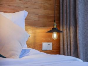 Ένα ή περισσότερα κρεβάτια σε δωμάτιο στο Villa EN Emerald Valley, Huangshan