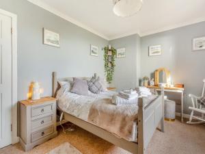 Ein Bett oder Betten in einem Zimmer der Unterkunft Seaview Cottage