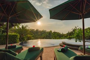 Bazén v ubytování Alamanda Lovina Resort nebo v jeho okolí