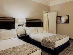 Giường trong phòng chung tại Crowne Plaza Rome St. Peter's by IHG