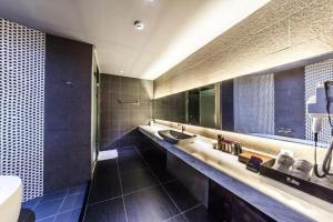 Koupelna v ubytování Jbis Hotel