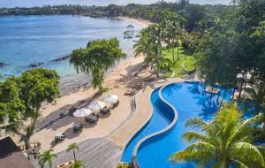 an aerial view of the beach and swimming pool at the resort at The Westin Turtle Bay Resort & Spa, Mauritius in Balaclava