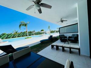 Басейн в Beach, Golf, Casino & Infinity Pool condo in Hard Rock, Punta Cana Área, Cana Rock Star або поблизу