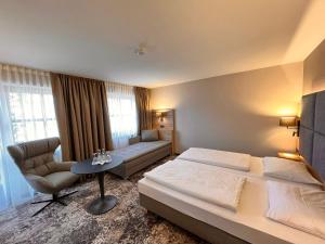 Postel nebo postele na pokoji v ubytování Appartment-Hotel-Hölzl + 37 fotografií