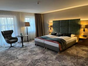 Postel nebo postele na pokoji v ubytování Appartment-Hotel-Hölzl
