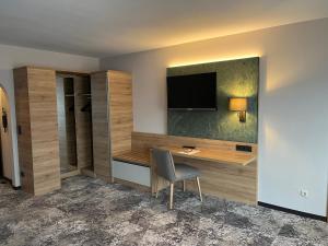 TV a/nebo společenská místnost v ubytování Appartment-Hotel-Hölzl