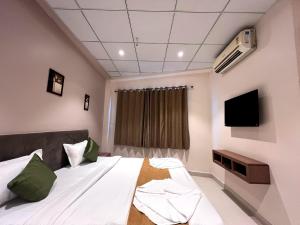 TV a/nebo společenská místnost v ubytování Hotel Grande Residency