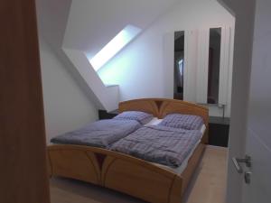 Tempat tidur dalam kamar di Haus Horst - Schwerin-Görries