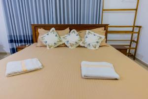 Rúm í herbergi á Classic Elegance Hotel