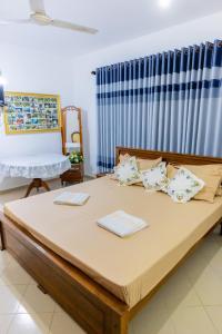 Postel nebo postele na pokoji v ubytování Classic Elegance Hotel