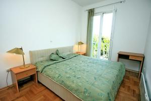 Katil atau katil-katil dalam bilik di Copacabana Apartment Dubrovnik