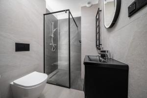 Kúpeľňa v ubytovaní CityCenterApartments-11/19 + 1 fotografia