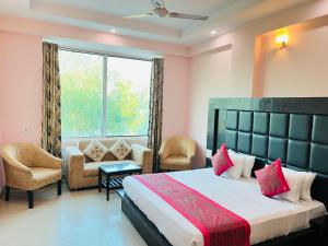 Krevet ili kreveti u jedinici u objektu Grand continental @ Har ki Pauri Haridwar