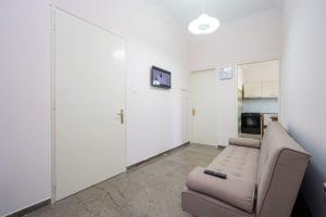 A kitchen or kitchenette at Vasilakis Apartment