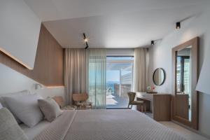 Voodi või voodid majutusasutuse Kassandra Bay Resort, Suites & Spa toas
