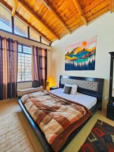 Gulta vai gultas numurā naktsmītnē Meraki - Entire 3BHK Villa With Himalayan Views