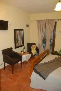 Postel nebo postele na pokoji v ubytování Guesthouse Kalypso