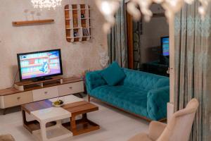 Et tv og/eller underholdning på Bungalov Maşukiye Villa