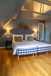 Rúm í herbergi á Hotel ML