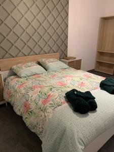 Posteľ alebo postele v izbe v ubytovaní Gîte Zen Lonora