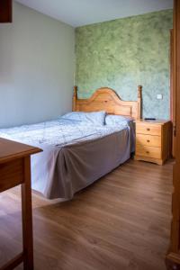 Cama o camas de una habitación en Hospedaje Rural Casa Parri