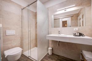 Koupelna v ubytování Arcadia Rooms