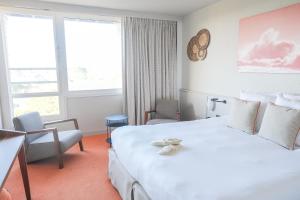 Cama o camas de una habitación en Thalazur Carnac - Hôtel & Spa