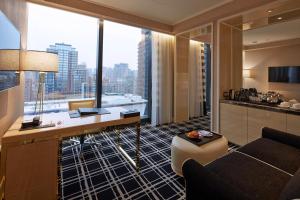 a hotel room with a view of a city at THE LIN Hotel in Taichung