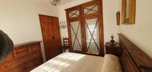 Postel nebo postele na pokoji v ubytování Huerta Carrión, Finca en El Pedroso