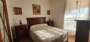 Postel nebo postele na pokoji v ubytování Huerta Carrión, Finca en El Pedroso