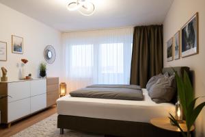 Posteľ alebo postele v izbe v ubytovaní MH Living - 39 - Scandinavian Living Dream in Center