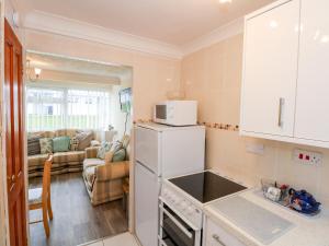 Kuchyň nebo kuchyňský kout v ubytování Chalet 12