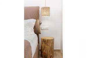 Ένα ή περισσότερα κρεβάτια σε δωμάτιο στο Seashell an Elegant Seafront Villa