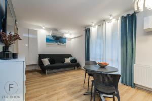 Et sittehjørne på Flatbook Apartmenty - Krynica Morska