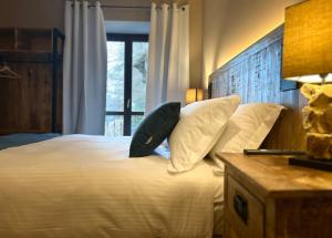 Postel nebo postele na pokoji v ubytování Hotel Paradiso Como
