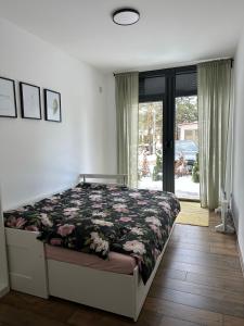 Una cama o camas en una habitación de Apartman PLAY Divčibare - 2 spavaće sobe